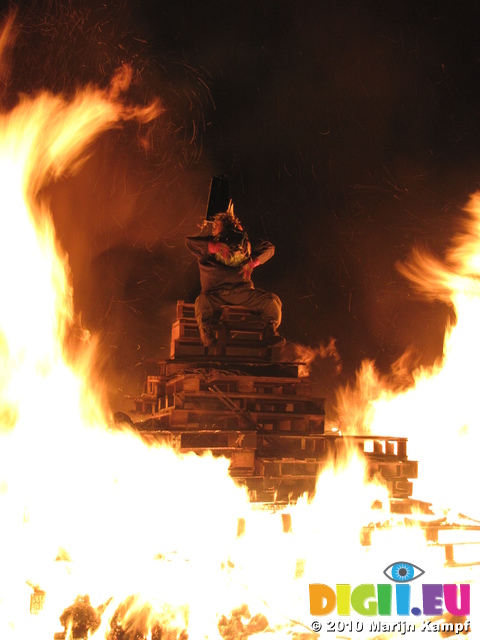 SX16802 Guy on top of bonfire